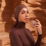 Cargar imagen en el visor de la galería, Huda Beauty - Glowish Soft Radiance Bronzing Powder
