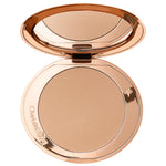 Cargar imagen en el visor de la galería, Charlotte Tilbury - A Matte Bronzing Filter For Face And Body 1 Fair
